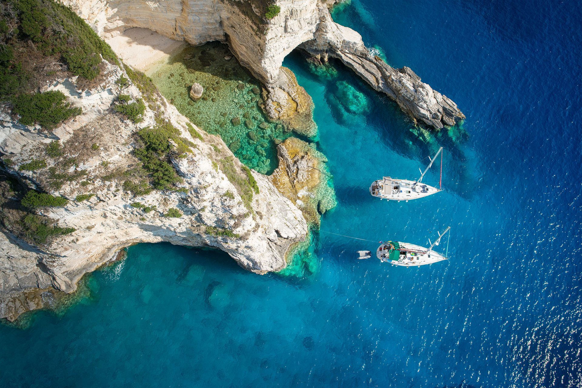 bigstock-Sailboats-in-a-beautiful-bay - 149888219(1).jpg